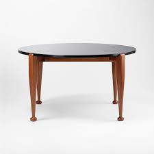 Our stone coffee tables also come in a variety of shapes. Coffee Table 965 Mahogany Granite Josef Frank Svenskt Tenn