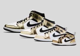 The decorative pieces take the form of a gold jumpman pendant and various matching gold lace jewels, including the familiar wings logo and rectangular plates stamped with '1985' and 'women.' Air Jordan 1 Mid Se Metallic Gold Full Family Release Info Sneakernews Com