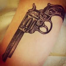 Of course, if you want to encapsulate everything that you are in one tattoo design, you could always have many images around the gun; 40 Awesome Pistol Gun Tattoos Design Ever Made