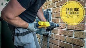 Rent a right angle drill and use selfeed or hole saw bits for boring large holes (fig. How To Drill Through A Wall Youtube