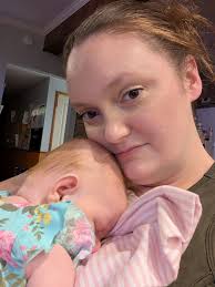 Why do two month old babies stare off?