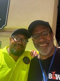 Who is the person in the photo with the class of 88 member?