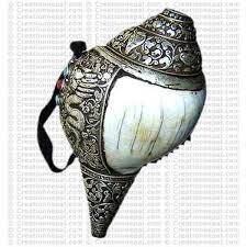Silver conch shell ornaments in flames. Creation Nepal Silver Shell Conch Handicrafts Clothing Dharma Ware Jewelry Fair Trade Accessories Suppliers