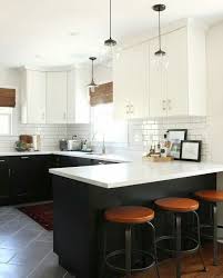 white uppers, black lowers, subway tile