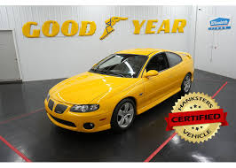 Image result for Yellow 2004 Pontiac