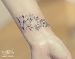 Pin By Dev Dan On Tattoo Flower Wrist Tattoos Subtle Tattoos Tattoos