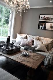 In this cool and modern living room, the paintings pick up on the grey tones used throughout the space, and are also reflected in the pattern of the woven throw. Top Ten Decor Inspiration Apartment Decor Simply Taralynn Home Apartment Decor Home Decor