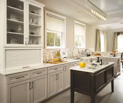 shaker kitchen cabinets with a neutral