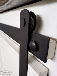 What type of wood do you use to make a barn door? Barn Door Hardware Diy How To Make Your Own Exploring Domesticity