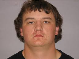 Report: 4 fmr. AU football players admit to charges