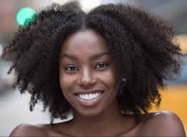 He's thinking is it her natural hair or does she coloured it