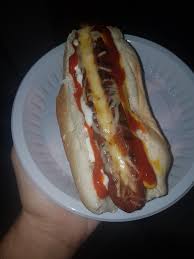 We rarely think of our. Homemade Gouda Stuffed Hot Dog Mustard Ketchup Mayo Siracha On A Bed Of White Onions And Jalapenos In A Bun Food