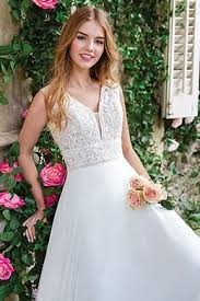 A wedding dress or bridal gown is a dress worn by a bride on her wedding day. Wedding Dresses For The Elegant And Sophisticated Bride Justin Alexander