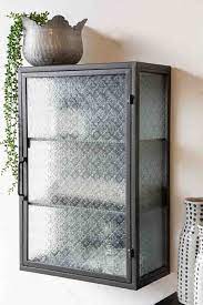 The newer models of these cabinets hold modern servers, which are mostly shorter in height. Industrial Style Metal Bathroom Cabinet With Patterned Glass Door Rockett St George