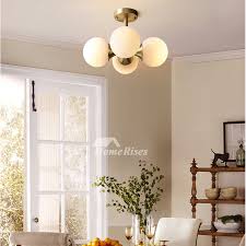 Glass is one of our most popular options for shades — we have a variety of glass pendant light shades, glass ceiling fan lights and more. Living Room Chandelier Nordic Personality Creative Brass Glass Shades 4 Lights Gold Designer Ceiling Lights