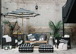 Black drum outdoor coffee table. Our Outdoor Furniture Picks To Get You And Your Outdoor Space Ready For Spring Summer Emily Henderson