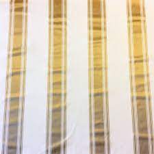 Seamless christmas vertical border pattern with red poinsettia, holly, mistletoe and berries on the gold stripe. Striped Ottoman Rib Silk Look White Metallic Gold Stripe Upholstery Home Dec Fabric Nl219