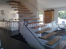 Dazzling white staircase with clamped glass. Self Supporting Wooden Open Staircase Mistral Extra White Glass By Siller Treppen