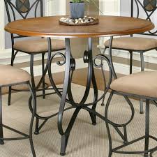 This difference is not easily discernible without measuring. Cramco Inc Ravine Round Pub Table W Oal Wood Top Royal Furniture Pub Table