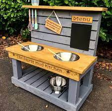 A mud kitchen is a really fun way outdoor play activity that will keep kids busy for hours. Childs Personalised Mud Kitchen Solid Oak Designs
