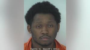 Stone Mountain man charged with robbing teen at gunpoint