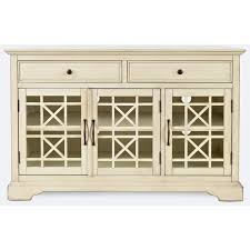 Beautiful low and large rustic and shabby chic style cabinet in cream color that can accommodate tv, media storage or any other consoles or objects. Craftsman 50 Antique Cream Media Console W 3 Glass Doors 2 Drawers By Jofran Furniture