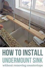 There are no clips holding the sink to the bottom of the counter. Undermount Sink Installation Tips And Tricks Undermount Sink Kitchen Sink Install Kitchen Decor Inspiration