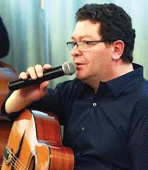 The Henry Acker Gypsy Jazz Trio entertains at the library