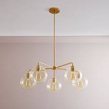 The way you light your home is important, and vanity lights can add a beautiful touch to many rooms in your home. Sculptural Glass 5 Light Globe Chandelier Champagne