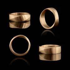Mccaul Goldsmiths Mccaulgoldsmiths Instagram Photos And Videos Mobius Ring Custom Wedding Rings Wedding Ring Metals