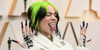 The singer has traded in her signature lime green and black straight hair color for a bright blonde locks, layers and bangs. Who Is Billie Eilish We Answered Popular Questions About The Singer