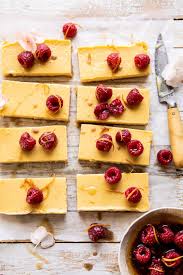Creamy Lemon Bars With Browned Butter Raspberries Half Baked Harvest Recipe In 2020 Creamy Lemon Bars Lemon Dessert Recipes Dessert Recipes