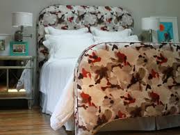 Classic upholstered platform bed with wing back, tufting and nailheads. How To Make An Upholstered Footboard
