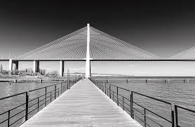 Portugal's greatest explorer the vasco da gama bridge was built for world expo '98, which conveniently coincided with the fifth centenary of traverse over the tagus river via europe's longest bridge, the vasco da gama bridge. Vasco Da Gama Bridge 001 Photograph By Fernando Blanco Farias