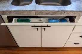 2 door 1 false front sink base cabinet with trash rollout on left side. Here S How Hidden Cabinet Hacks Dramatically Increased My Kitchen Storage Apartment Therapy