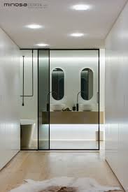 This is an example of a small classic ensuite bathroom in london with an alcove bath, white walls, a submerged sink, white floors and grey worktops. Minosa Design Glass Door 2 Walsh Bay Kbdi Small Bathroom Year Australian Bathroom Designer 2013 Darren Genner Design Library Au