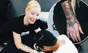 Azalea is now known for her love of horse riding and bought two horses called defender and strictly business in 2015. Iggy Azalea Shows Off Her Sleeve Tattoo For The First Time At Gq Men Of The Year Awards Daily Mail Online