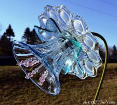 Flowers are still the best way to help share a little light in the world. Pin By Carol Jensen On Funky Junk Don T Break The Flowers Glass Garden Art Glass Garden Glass Garden Flowers