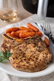 Place the pork chops on a plate, cover them, and let them rest for a few minutes. Air Fryer Pork Chops Cook The Story