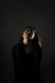 A woman standing in front of a green wall photo – Free Woman Image on  Unsplash