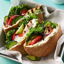 Greek Chicken Cucumber Pita Sandwiches With Yogurt Sauce Recipe In 2020 Pita Sandwiches Greek Chicken Pita Recipes