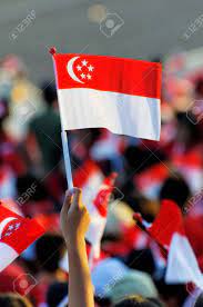 Their flag days are held at different parts of the year. Audience Waving Singapore Flag During Singapore National Day Parade Ndp Rehearsal At Singapore Marina Bay Floating Platform On 25 Jul 2009 Stock Photo Picture And Royalty Free Image Image 35674456