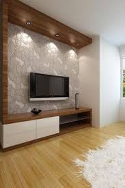 A wood clad feature wall is one of those versatile details that looks good just about anywhere, the impact is strong, adding a rustic sophistication to traditional or modern bedroom design schemes. False Ceiling Ideas With Wood False Ceiling Wedding Magazines False Ceiling Living Room Beds False Ceili Modern Tv Wall Units Bedroom Tv Wall Wall Unit Designs