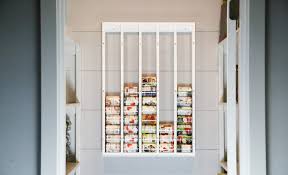 This is a super simple design that will make storing your canned food a breeze. Wall Mounted Can Organizer Ana White