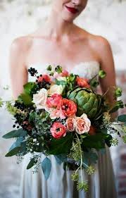 And a coral boutonniere to a groom's grey suit for a romantic touch. Unique Wedding Bouquet Cream Peach Coral Roses Green Hydrangea Green Artichoke Dark Blue Winter Wedding Bouquet Gorgeous Wedding Bouquet Wedding Bouquets