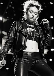Miley cyrus wasn't scheduled to be at night 1 of the iheartradio music festival, but no one minded that billy idol brought a guest along. Pin On Smileymiley