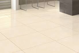 A tile with a slight sheen to it offering a small amount of light reflection at certain angles. Marble Effect Tiles Cream Polished Rectified Porcelain Stonewar