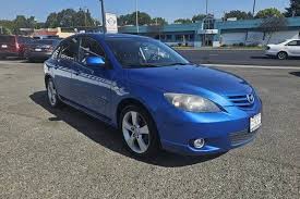 Image result for Electric Blue 2007 Mazda3