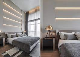 A Layered Accent Wall With Indirect Lighting Creates A Glow Above The Headboard In This Bedr Accent Lighting Living Room Ceiling Design Living Room Accent Wall