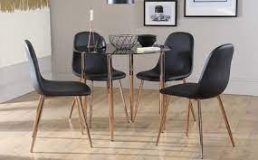 Choose one of our stylish rustic table lamps or tree lamps to help accent your other decor items. Horizon Round Black Glass Dining Table With 4 Brooklyn Chairs Copper Legs Dining Table Copper Copper Dining Room Glass Dining Set